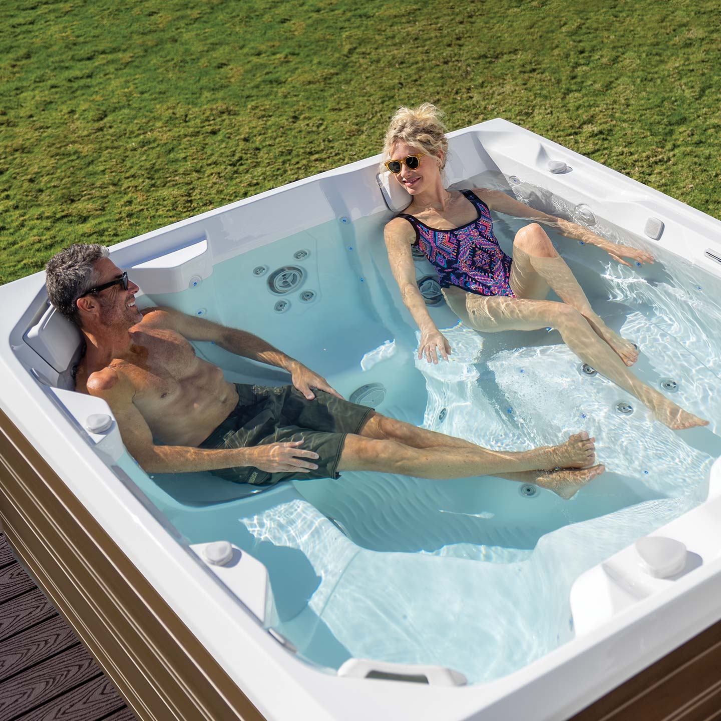 2 people enjoying a hot tub