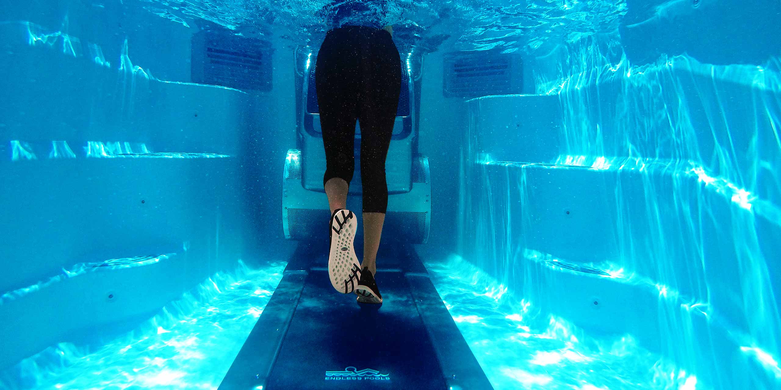 person using underwater treadmill