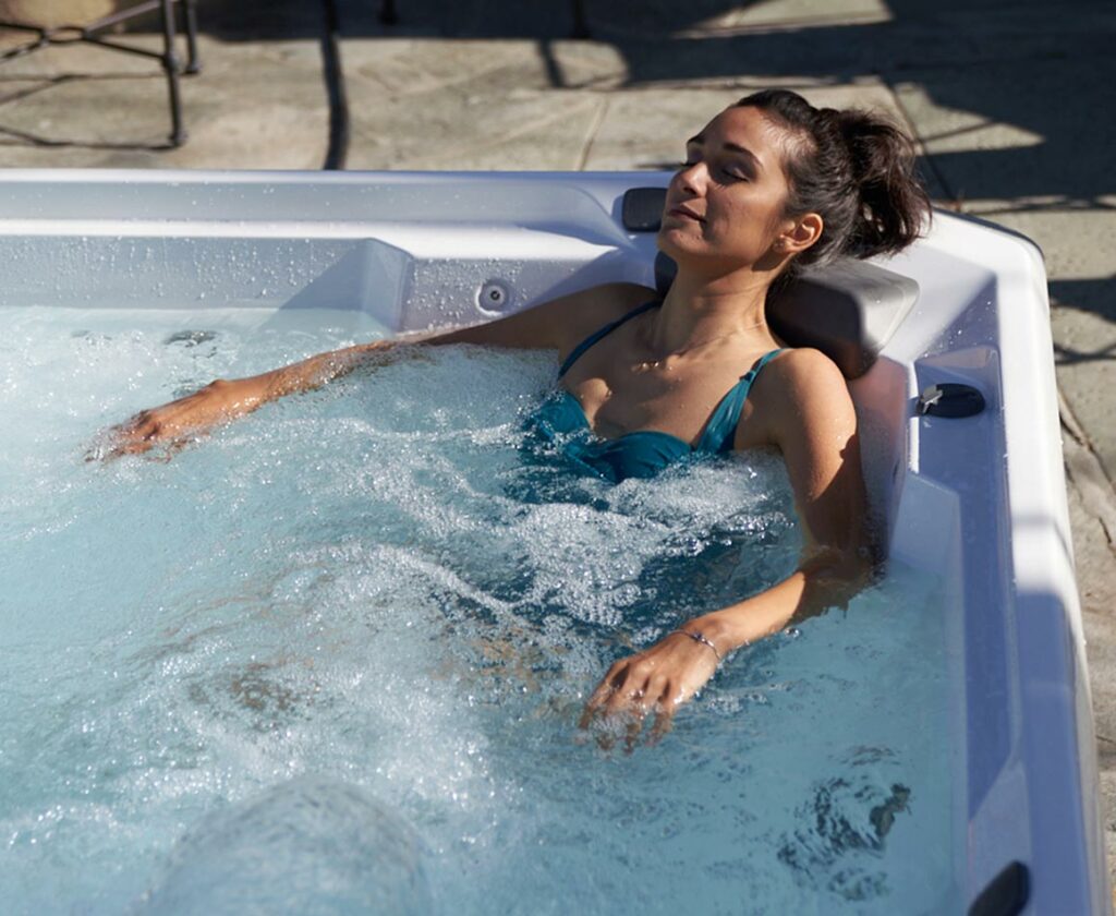 woman relaxing in a hot tub