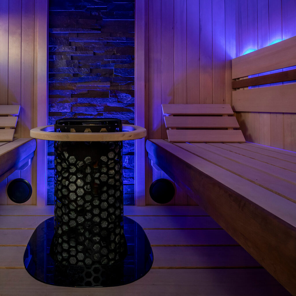custom cut sauna interior with blue tinted lighting