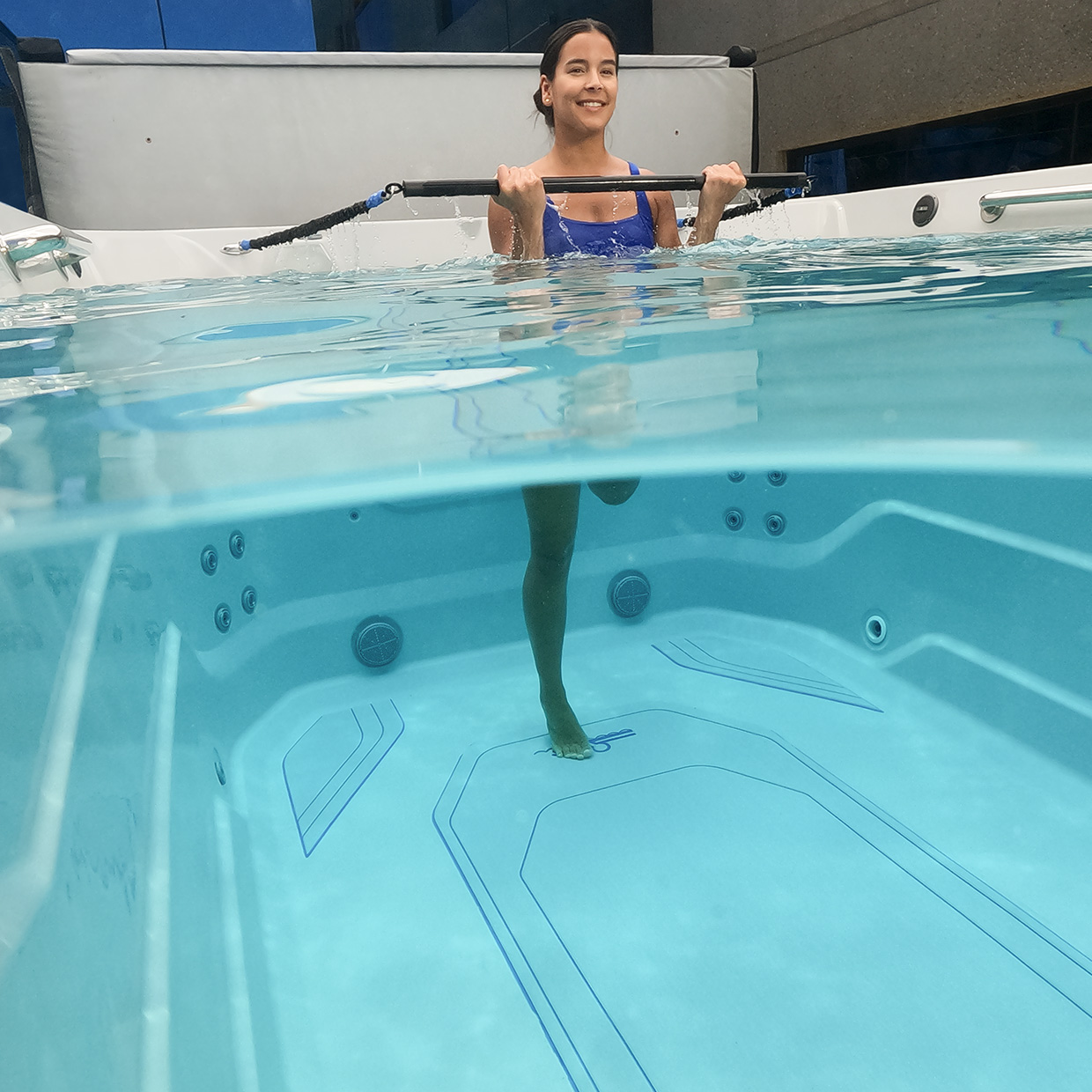 woman exercising in a swim spa